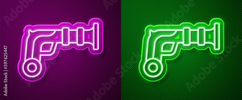Glowing neon line Vintage pistols icon isolated on purple and green background. Ancient weapon. Vector.