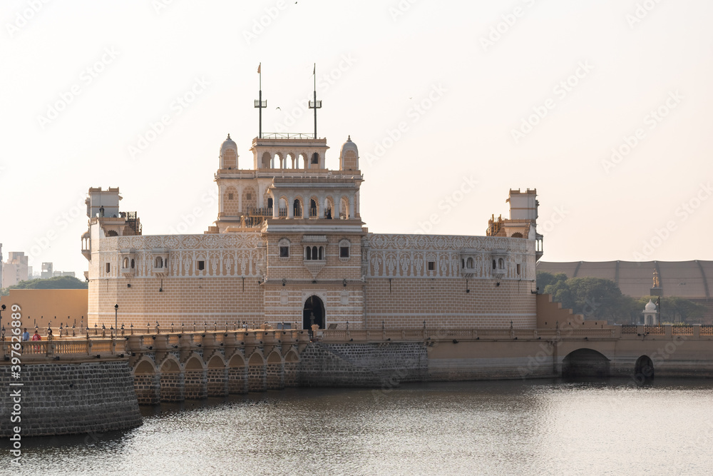 The old architecture of the ancient fortress of Lakhota Palace in Ranmal lake in the town of Jamnagar in Gujarat, India.