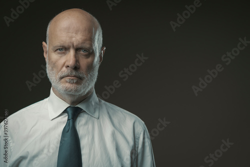 Confident middle-aged senior businessman portrait