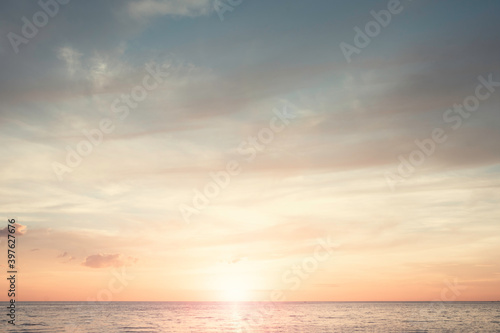 Sunset beach sky background concept, sunrise colors clouds, horizon dawn sunlight. photo