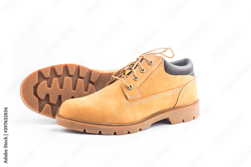 Yellow nubuck leather men's boots on white background Yellow nubuck leather men's boots on white background
