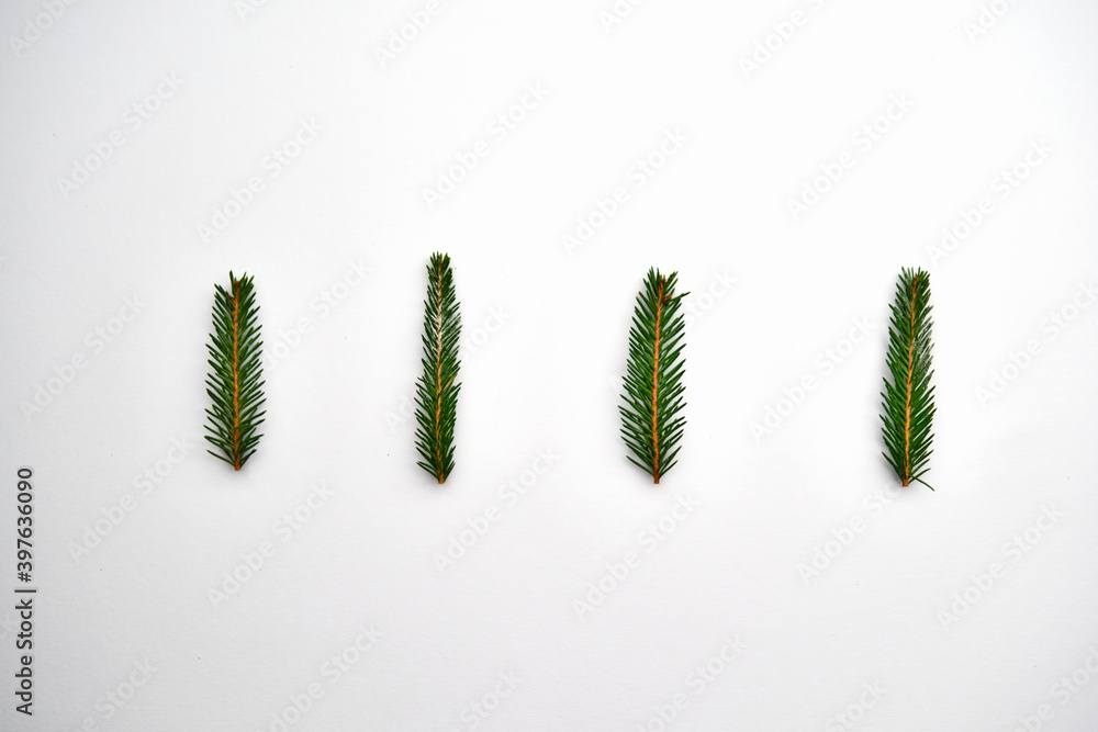 Creative frame made of Christmas fir branches on white background with decoration. greeting card, winter holiday. Flat lay Creative frame made of Christmas fir branches on white background with decoration. greeting card, winter holiday. Flat lay