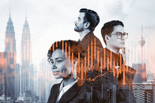 Photography Group of business colleagues in suits as a part of multinational corporate team working on forecasting trading corporate strategy at fund