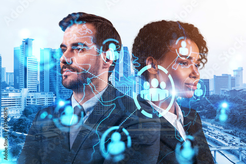 Photography Businessman and businesswoman as a SMM specialists thinking about development of social media marketing strategy to achieve business goals