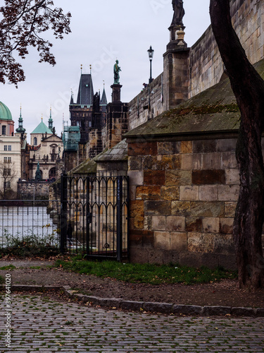 View on Prague's Old Town from Kampa Island across the Vltava River on an autumn evening