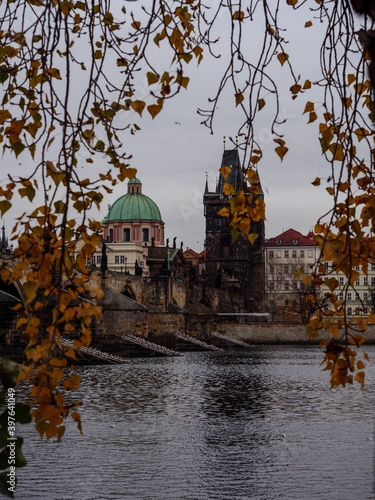 View on Prague's Old Town from Kampa Island across the Vltava River on an autumn evening