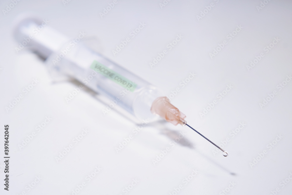 injection with corona, COVID-19 vaccine, extreme close up, free copy space, symbol picture injection with corona, COVID-19 vaccine, extreme close up, free copy space, symbol picture