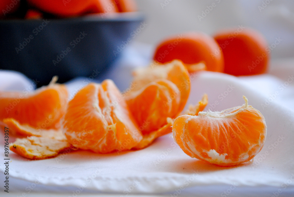 Ripe clementine tangerines close-up on the table. Ripe clementine tangerines close-up on the table.