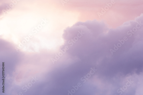 Soft pink clouds in sunset sky