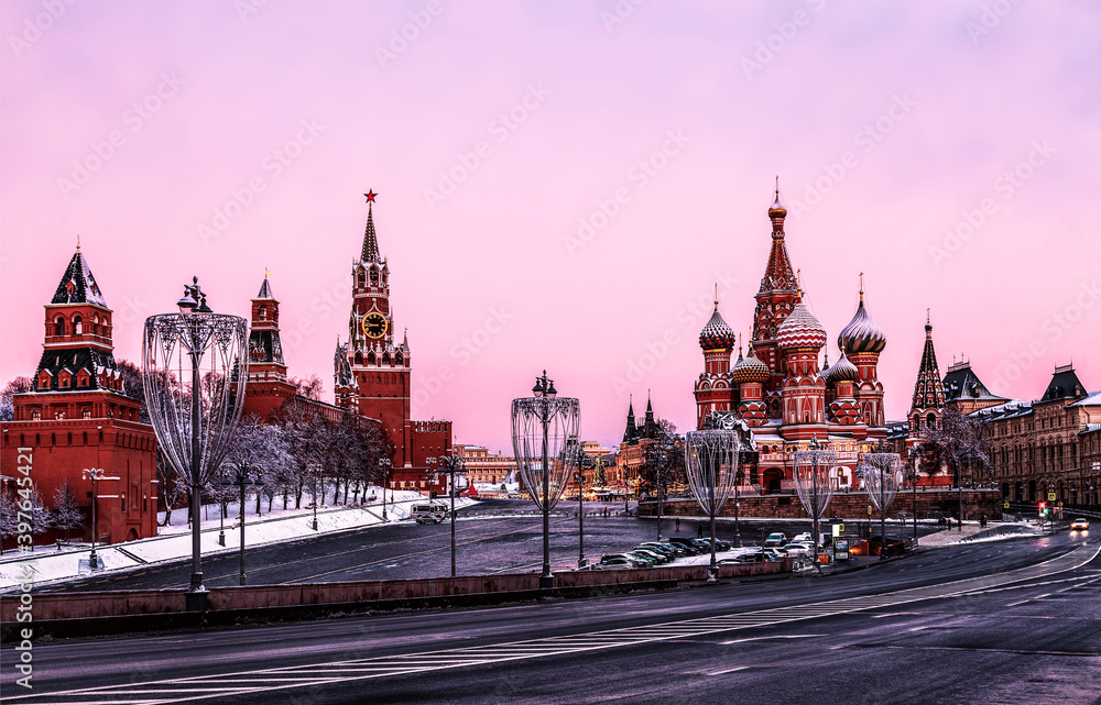 The morning views of the Moscow Kremlin and St. Basil's Cathedral with Moskvoretsky bridge. Russia The morning views of the Moscow Kremlin and St. Basil's Cathedral with Moskvoretsky bridge. Russia