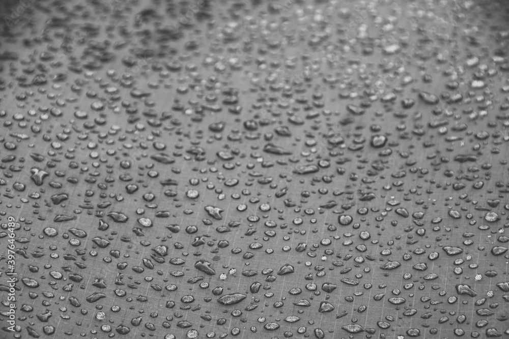Water drops on smooth surface of waterproof fabric Water drops on smooth surface of waterproof fabric
