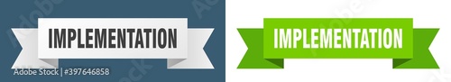 implementation ribbon. implementation isolated paper sign. banner