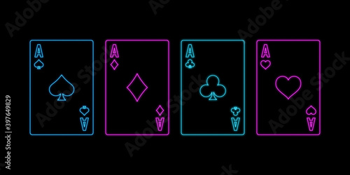 Neon sign of playing aces cards on the black background. Concept of poker, casino and gambling.