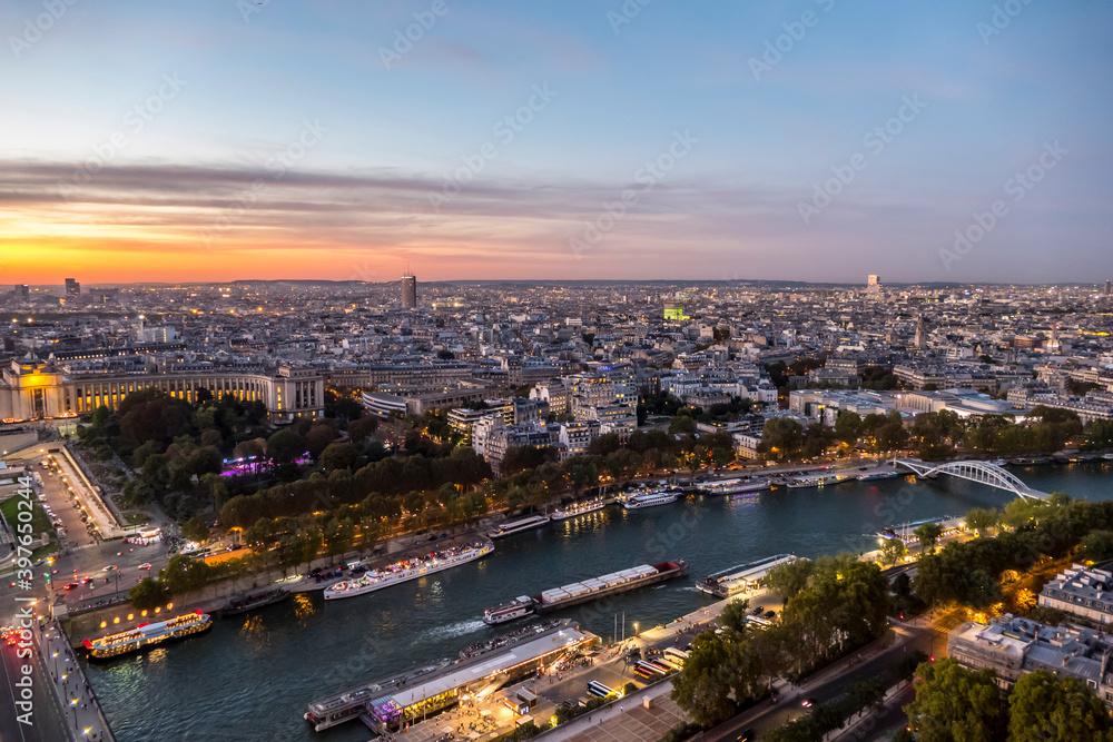Aerial view of Paris and the Seine River at sunset