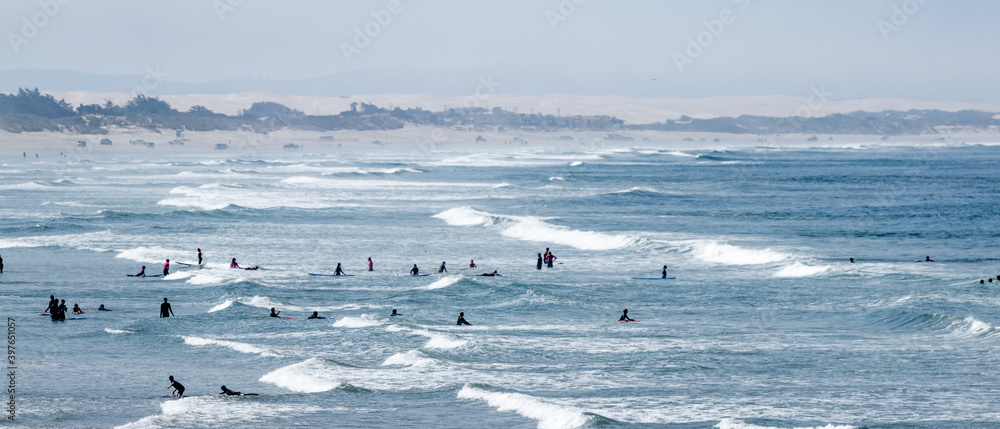 Surfers on Pismo beach