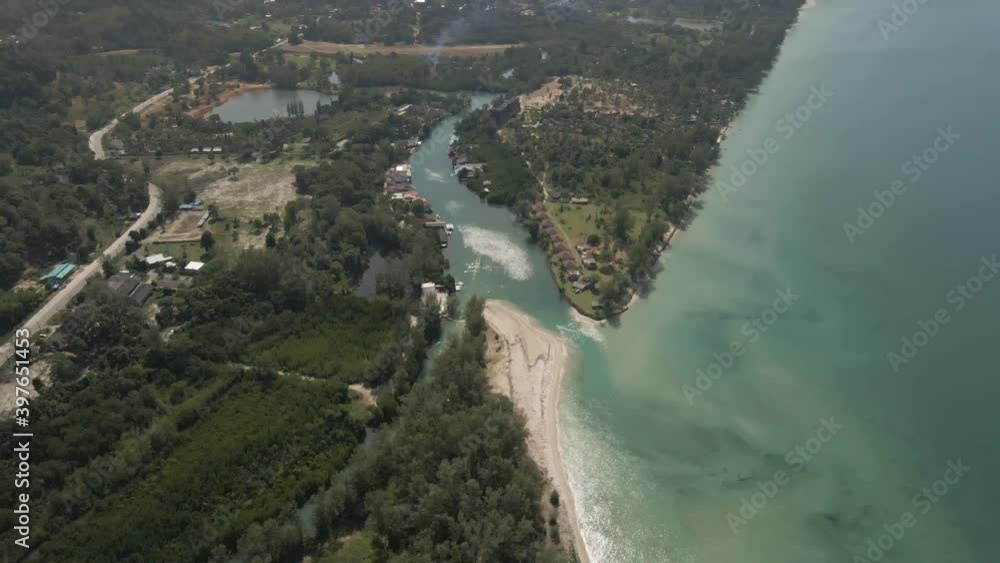 Aerial tilt up view of Koh Chang Klong Prao village beach coastline jungle Aerial tilt up view of Koh Chang Klong Prao village beach coastline jungle