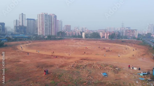 Mira road playground under construction city line cityscape buildings and mountains drone shot bird's eye view photo