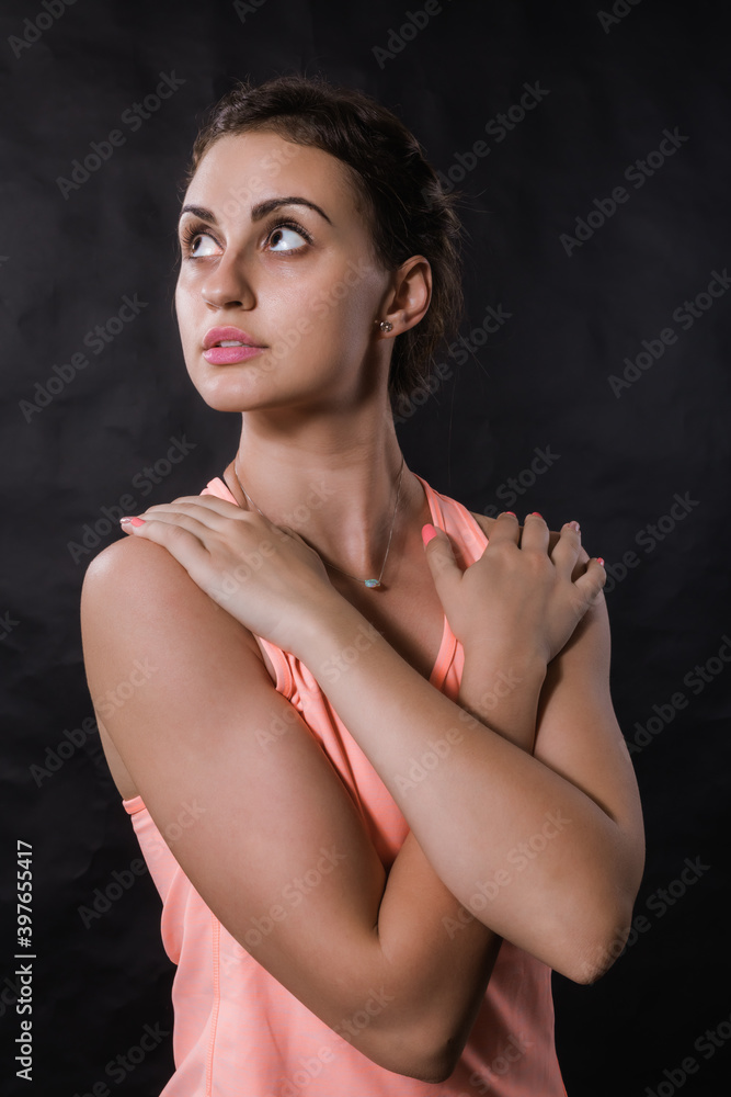 Fototapeta premium Beautiful young woman dressed in sportswear