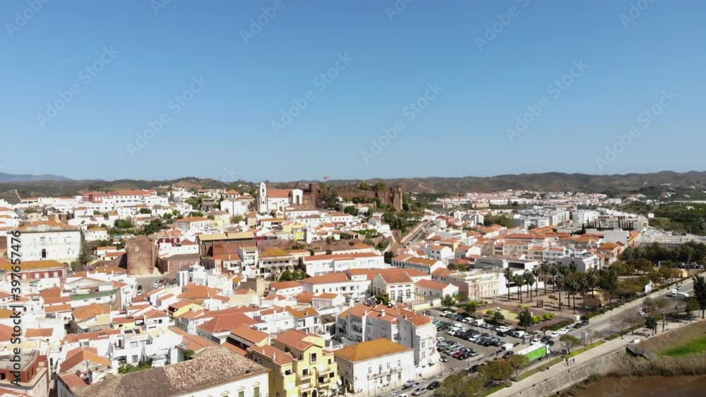 Cityscape view of Silves In Algarve, Portugal - Low angle Orbit Aerial shot Cityscape view of Silves In Algarve, Portugal - Low angle Orbit Aerial shot