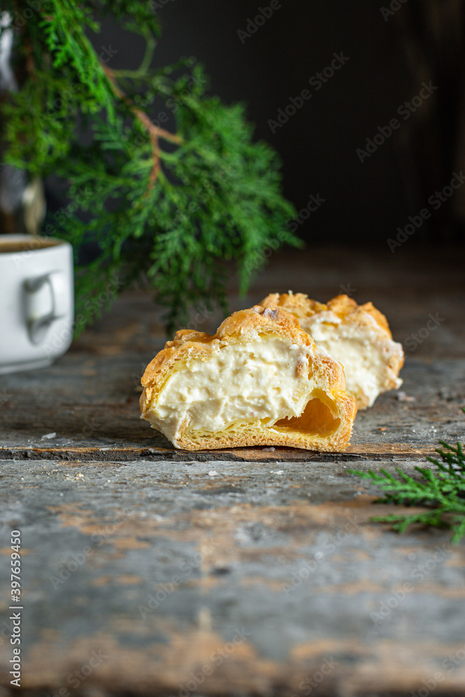 choux pastry eclair shu profiterole the filling is sweet or savory fluffy dough homemade cake for the holiday ready to eat on the table meal snack top view copy space for text food background rustic choux pastry eclair shu profiterole the filling is sweet or savory fluffy dough homemade cake for the holiday ready to eat on the table meal snack top view copy space for text food background rustic