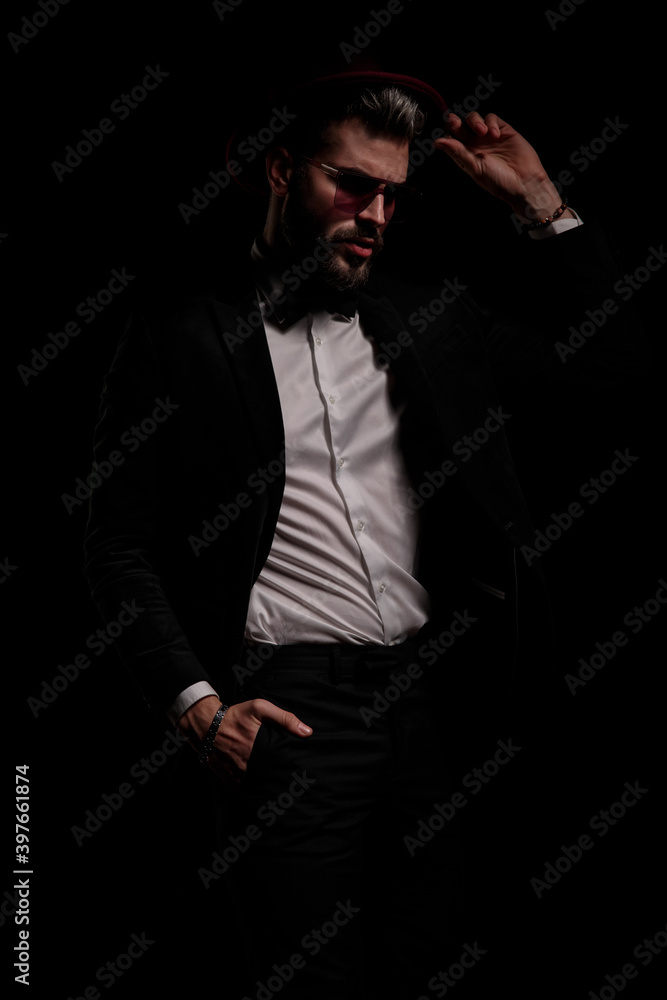 elegant fashion model holding hand in pocket elegant fashion model holding hand in pocket