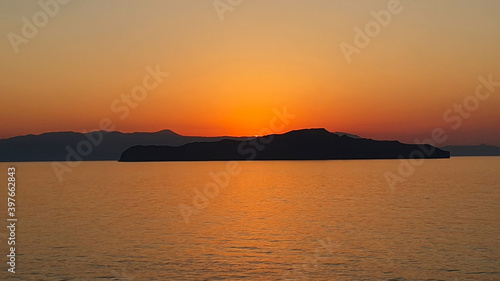 Colorful sunset over the water on Crete  Greece.