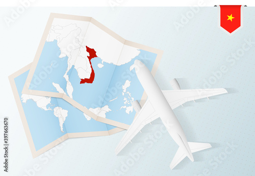 Travel to Vietnam, top view airplane with map and flag of Vietnam.