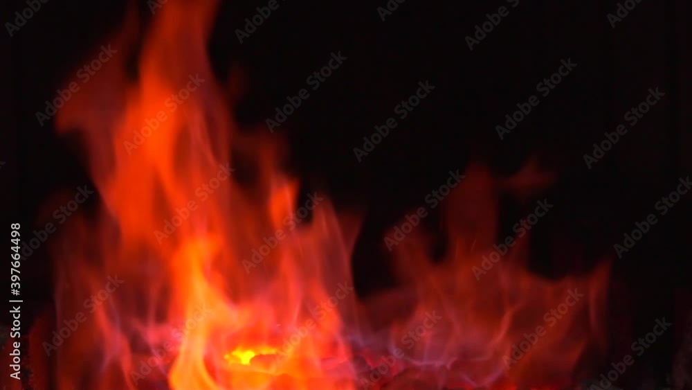 Fire embers particles over black background. Fire sparks background. Abstract dark glitter fire particles lights. Fire embers particles over black background. Fire sparks background. Abstract dark glitter fire particles lights.