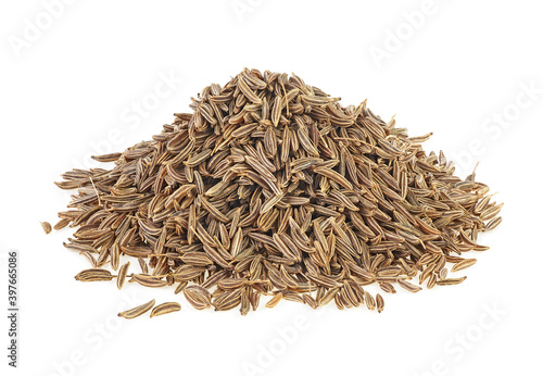 Pile of cumin seeds isolated on a white background. Dried cumin seeds. Caraway. photo