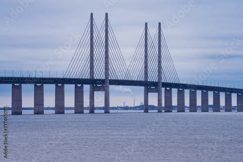 The Sound Bridge, the bridge and underwater tunnel connecting Malmo, Sweden with Copenhagen, Denmark. Blue sky and water in the background