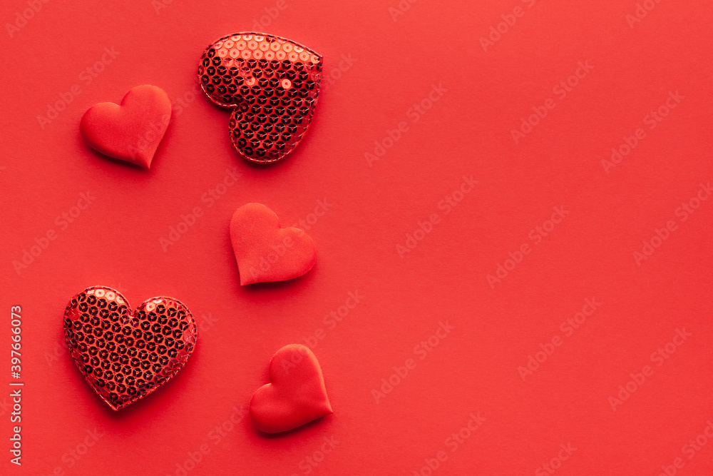 Valentine's day or Wedding romantic concept. Red hearts on red background.Top view, flat lay, copy space.