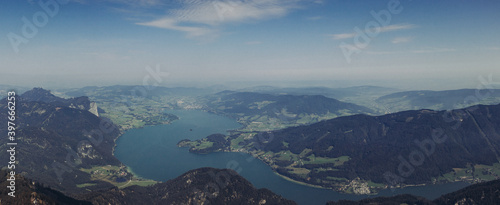 Phenomenal view from Mount Schafberg to Lake Mondsee and its surrounding towns. A tourist famous spot. Lake in the Upper Austrian part of the Salzkammergut and near the larger Attersee photo