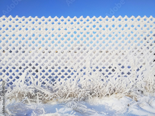 snow covered fence palisade paling