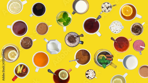 Fototapeta Naklejka Na Ścianę i Meble -  Many different cups with drinks and desserts on yellow background