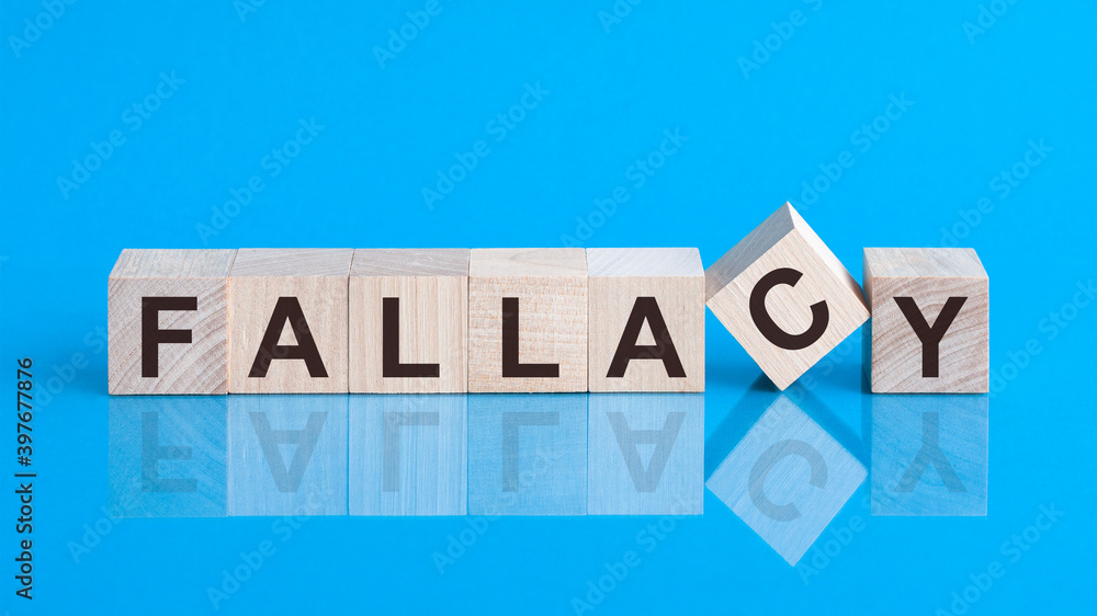 the text FALLACY is written on the cubes in black letters, the cubes ...