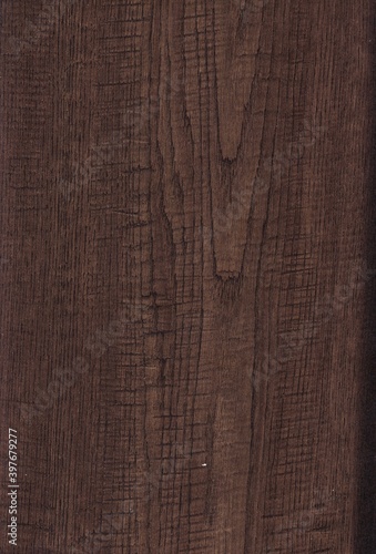 The texture of freshly cut wood. Annual rings and cracks in the old tree. Horizontal  wooden background. Texture in high resolution. Color image.