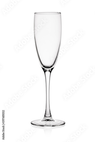 Empty glass champagne flute isolated on white background.