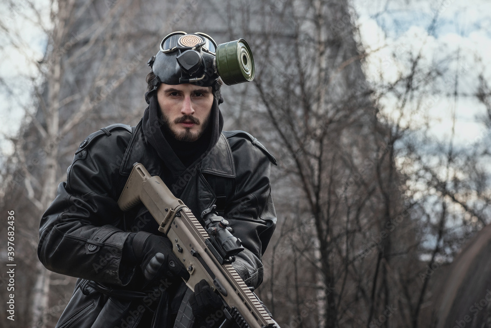 Post apocalypse soldier with a rifle concept. Post apocalypse soldier with a rifle concept.