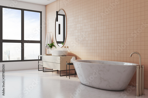Modern bathroom interior with marble bath