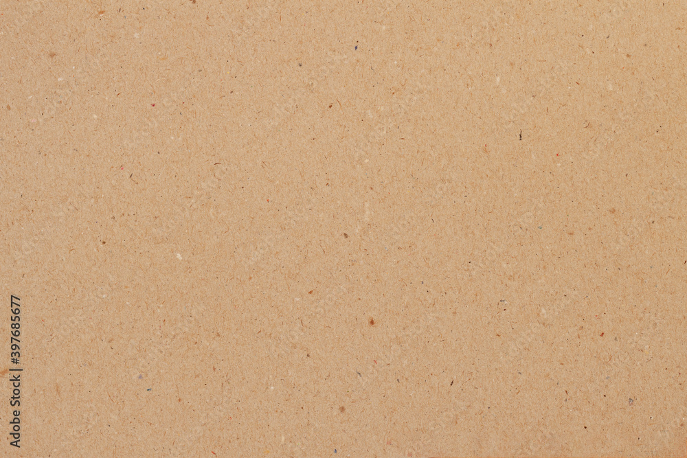 Cardboard, brown paper texture background close-up, surface with inclusions of cellulose Cardboard, brown paper texture background close-up, surface with inclusions of cellulose