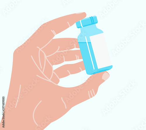 Hand holding antiviral covid 19 vaccine. Covid or coronavirus vaccination