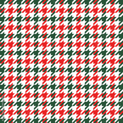 Goose foot. Christmas Pattern of crow's feet in red and white cage. Glen plaid. Houndstooth tartan tweed. Dogs tooth. Scottish checkered background. Seamless fabric texture. Vector illustration