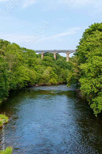 Pontcysyllte Aqueduct, carries the Llangollen Canal waters across the River Dee in the Vale of Llangollen in Wales. 18-arched stone and cast iron structure is for use by narrow, canal-boats. UK