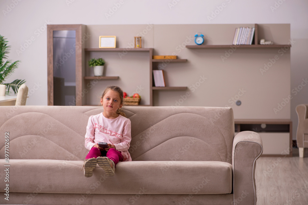 Small girl staying alone at home Small girl staying alone at home