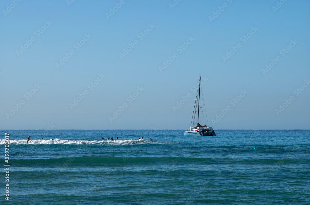 Fototapeta premium Waikiki Dream surfing and sailing vacation on Oahu in the Hawaiian Islands.