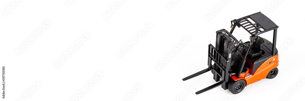 Red toy forklift loader isolated on white background. Horizontal web banner with Copy Space for text. moving service and distribution products. Delivery production. Logistics and industrial concept. Red toy forklift loader isolated on white background. Horizontal web banner with Copy Space for text. moving service and distribution products. Delivery production. Logistics and industrial concept.
