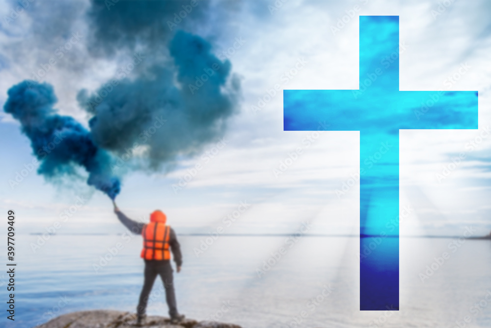 Obraz premium Calling God for help. Concept - man seeks help in religion. Cross as a symbol of religion. Man gives a signal of SOS. Guy with a smoke bomb near sea. Concept - got into trouble refers to the church