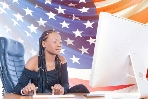Girl next to a computer on ...