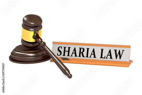 Wooden judge gavel and sharia law banner photo