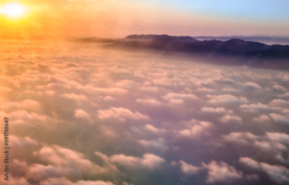 Golden hour above the clouds